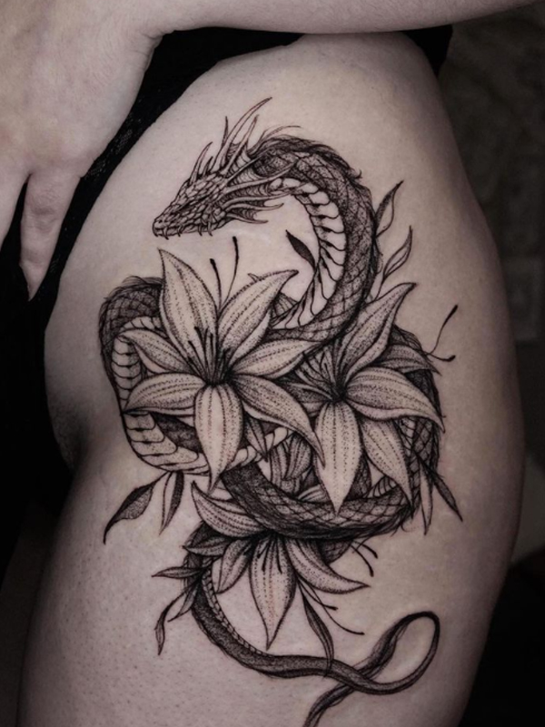 Amazing dragon flower tattoo