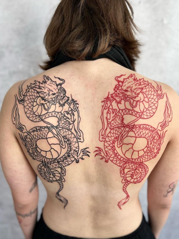 Stunning black and a red Dragon tattoo on the back