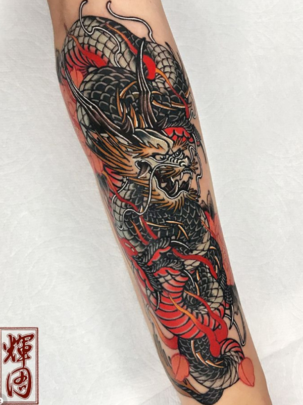 A Chinese dragon small red tattoo