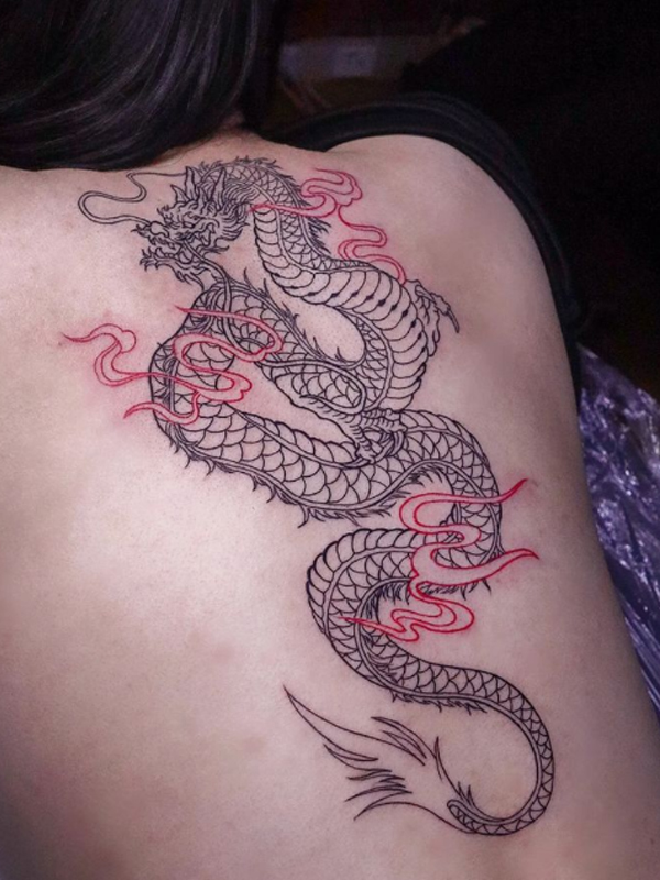 Fine line detailed dragon over the back