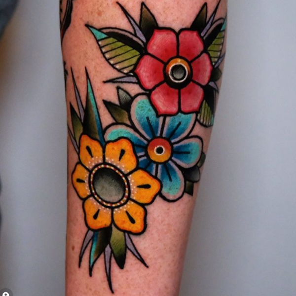 Awesome neo-traditional flower design tattoo