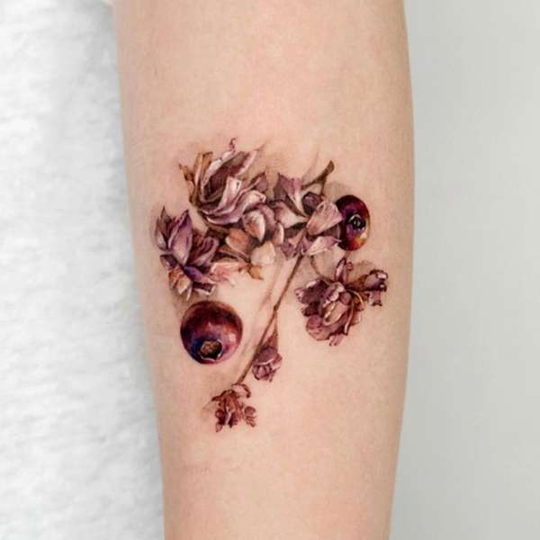 Elegant dry iris and eyeball flower tattoo