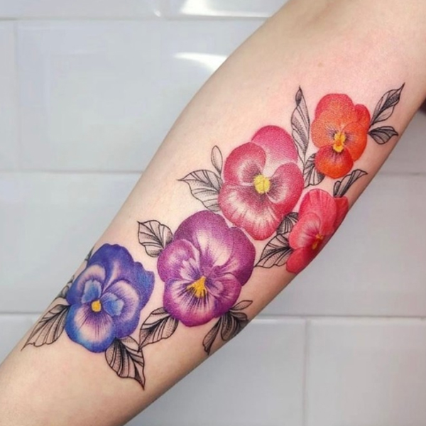 Graceful pansies Flower design tattoo