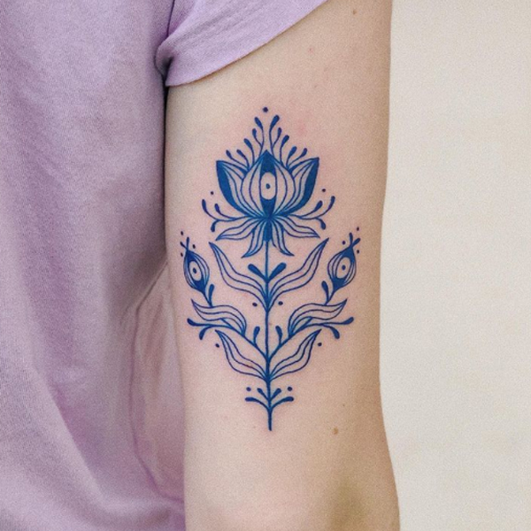 Elegant blue flower ornamental tattoo