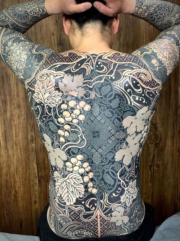 Alluring traditional black full body tattoo design