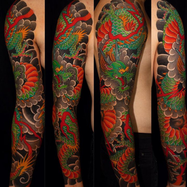 Dazzling green dragon full sleeve tattoo design