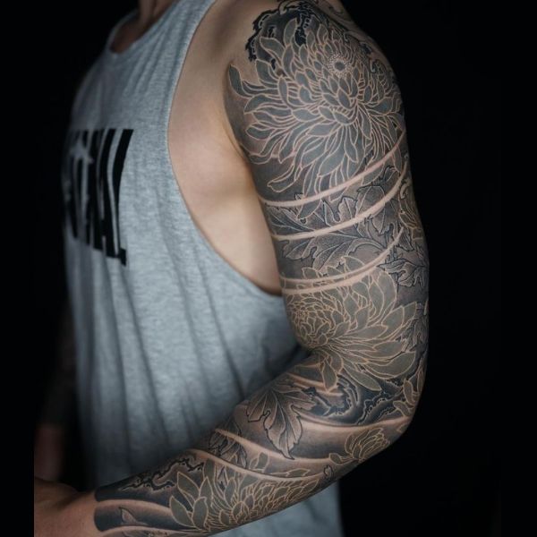 Gorgeous black and grey Japanese full sleeve tattoo