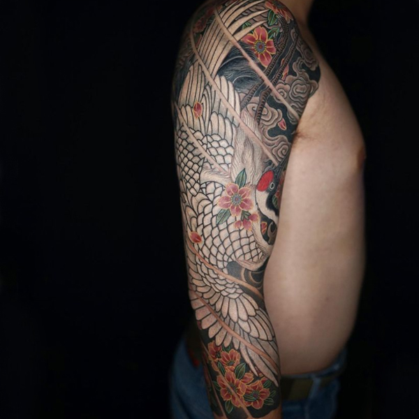 Gorgeous Traditional Japanese crane full sleeve tattoo
