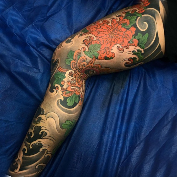 Amazing Japanese-style leg tattoo design