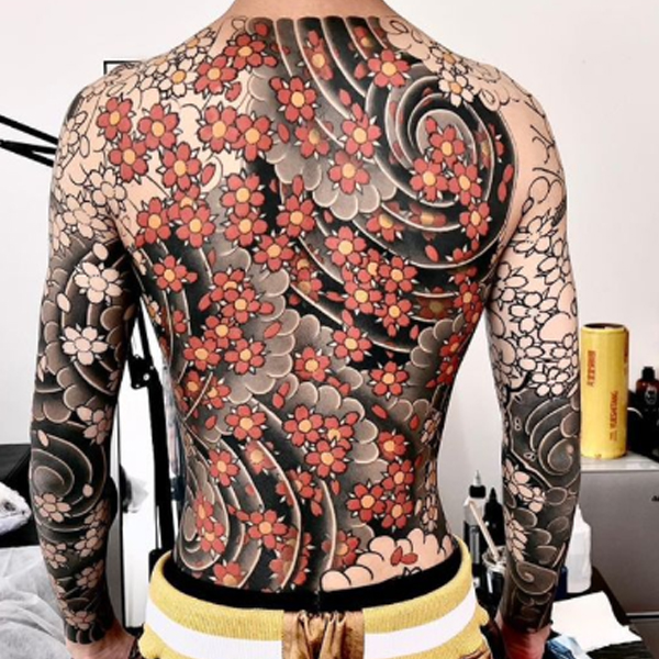 Lavish Japanese cherry blossom Full back piece tattoo