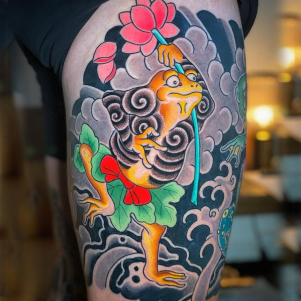 Stunning colorful frog black and grey wave Japanese tattoo