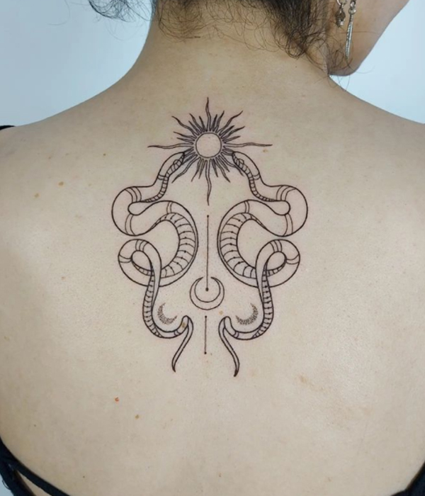 Beautiful Egyptian snake,sun, and moon tattoo design