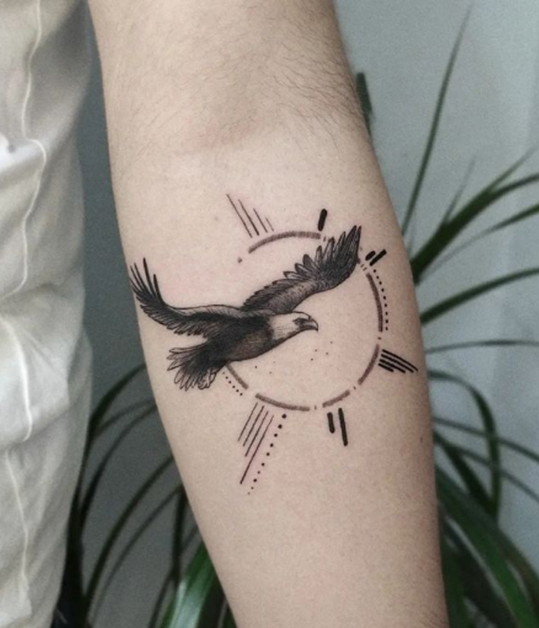 Tiny micro realism eagle and abstract design tattoo