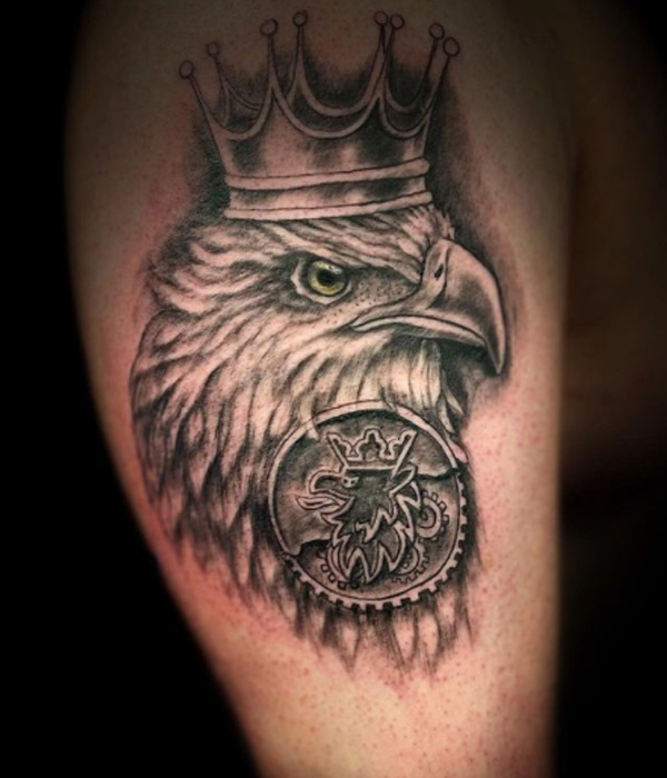 Black and grey eagle, antique coin, and crown tattoo design